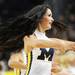 A Michigan member of the dance team performs during a break in the action during the first half of an NIT Season Tip-Off game at Crisler Center on Tuesday. Melanie Maxwell I AnnArbor.com